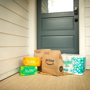 Amazon Fresh Grocery Delivery - a package of baby wipes and a bag of baby wipes - Grocery Near Me