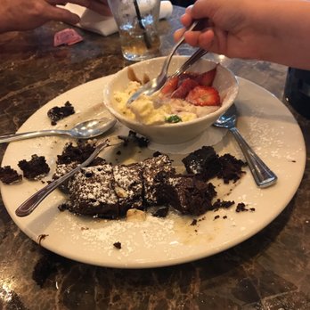 Maggiano's - Kids devouring brownies w/ice cream - Italian Near Me - Friendswood, Texas Maggiano's - Kids devouring brownies w/ice cream - Italian Near Me - Friendswood, Texas