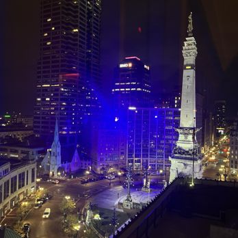 Astrea Rooftop - A beautiful view from inside, of the corner table - Bars Near Me - Indianapolis, Indiana Astrea Rooftop - A beautiful view from inside, of the corner table - Bars Near Me - Indianapolis, Indiana