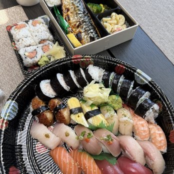 Sushi Nakata Express - 16-piece sushi + 2 cut rolls (blue crab and California), a spicy tuna roll, and mackerel bento box - Sushi Bars Near Me - La Cañada Flintridge, California