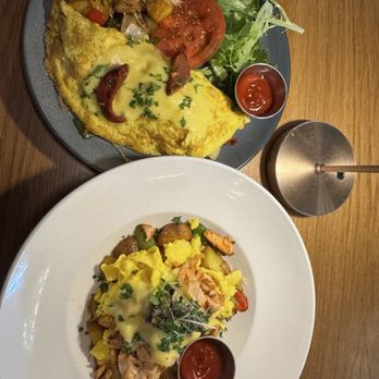 Station 16 - cajun sausage omelet (top) and salmon stack hash (bottom) - Cocktail Bars Near Me - Elk Grove, California Station 16 - cajun sausage omelet (top) and salmon stack hash (bottom) - Cocktail Bars Near Me - Elk Grove, California