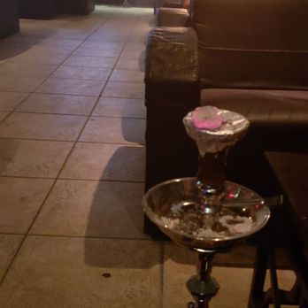 Shaherzad Hookah - a table with a hookah on it - Hookah Bars Near Me - Edison, New Jersey