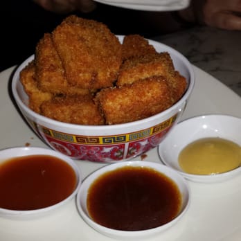 Trick Dog - 76. Chicken tricknuggets (13 pc $15): sweet and sour, chinese mustard and soy dipping sauces - Cocktail Bars Near Me - San Francisco, California Trick Dog - 76. Chicken tricknuggets (13 pc $15): sweet and sour, chinese mustard and soy dipping sauces - Cocktail Bars Near Me - San Francisco, California