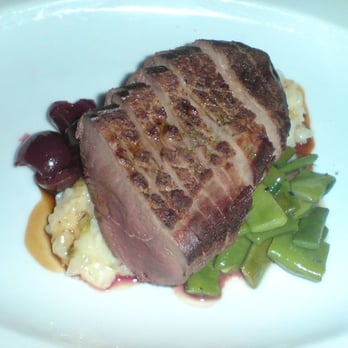 Bacchanalia - duck with risotto - New American Near Me - Atlanta, Georgia Bacchanalia - duck with risotto - New American Near Me - Atlanta, Georgia