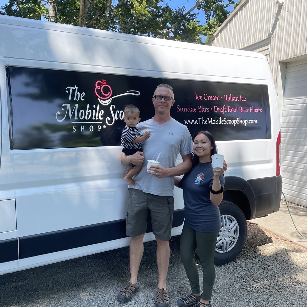 Mita's Italian Ice - a man and a woman and a child standing in front of a van - Ice Cream & Frozen Yogurt Near Me Mita's Italian Ice - a man and a woman and a child standing in front of a van - Ice Cream & Frozen Yogurt Near Me