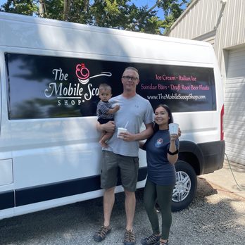 Mita's Italian Ice - a man and a woman and a child standing in front of a van - Ice Cream & Frozen Yogurt Near Me Mita's Italian Ice - a man and a woman and a child standing in front of a van - Ice Cream & Frozen Yogurt Near Me