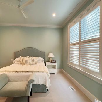 Timan & Co - Plantation shutters not only look beautiful in this bedroom, but they offer privacy for the bottom row, while letting light in on top. - Shades & Blinds Near Me - Cleveland, Ohio Timan & Co - Plantation shutters not only look beautiful in this bedroom, but they offer privacy for the bottom row, while letting light in on top. - Shades & Blinds Near Me - Cleveland, Ohio