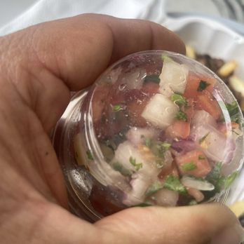 Roman's Mexi-Cali Grill - Pico. Translucent onions and wilted cilantro. - Mexican Near Me - Huntington Beach, California