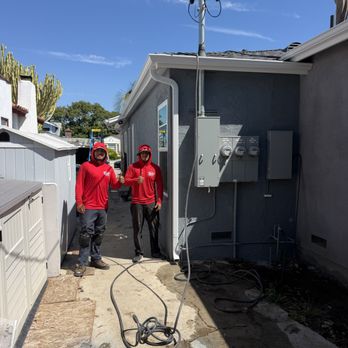 MDC Weatherproofing - Team working  to ensure the best downspout locations, great collaboration - Roofing Near Me - Fullerton, California