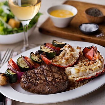 Logan's Roadhouse - Sirloin & Grilled Lobster Tail: Logan's juicy 8-ounce Black Angus sirloin paired with a grilled lobster tail. - Steakhouses Near Me - Sumter, South Carolina