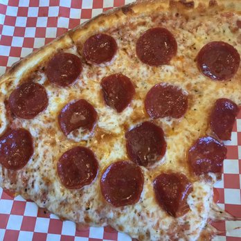 Submarinos Pizzeria - Two slices of pepperoni pizza - Pizza Near Me - Glendale, Arizona Submarinos Pizzeria - Two slices of pepperoni pizza - Pizza Near Me - Glendale, Arizona