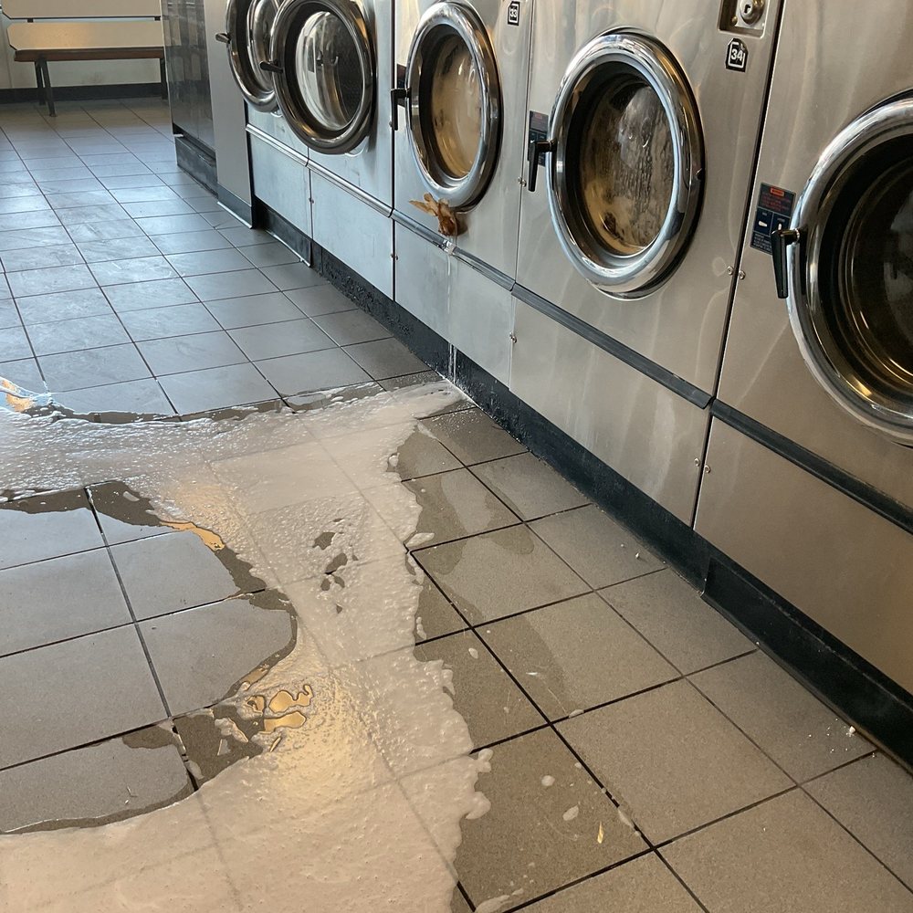 Washer liking water