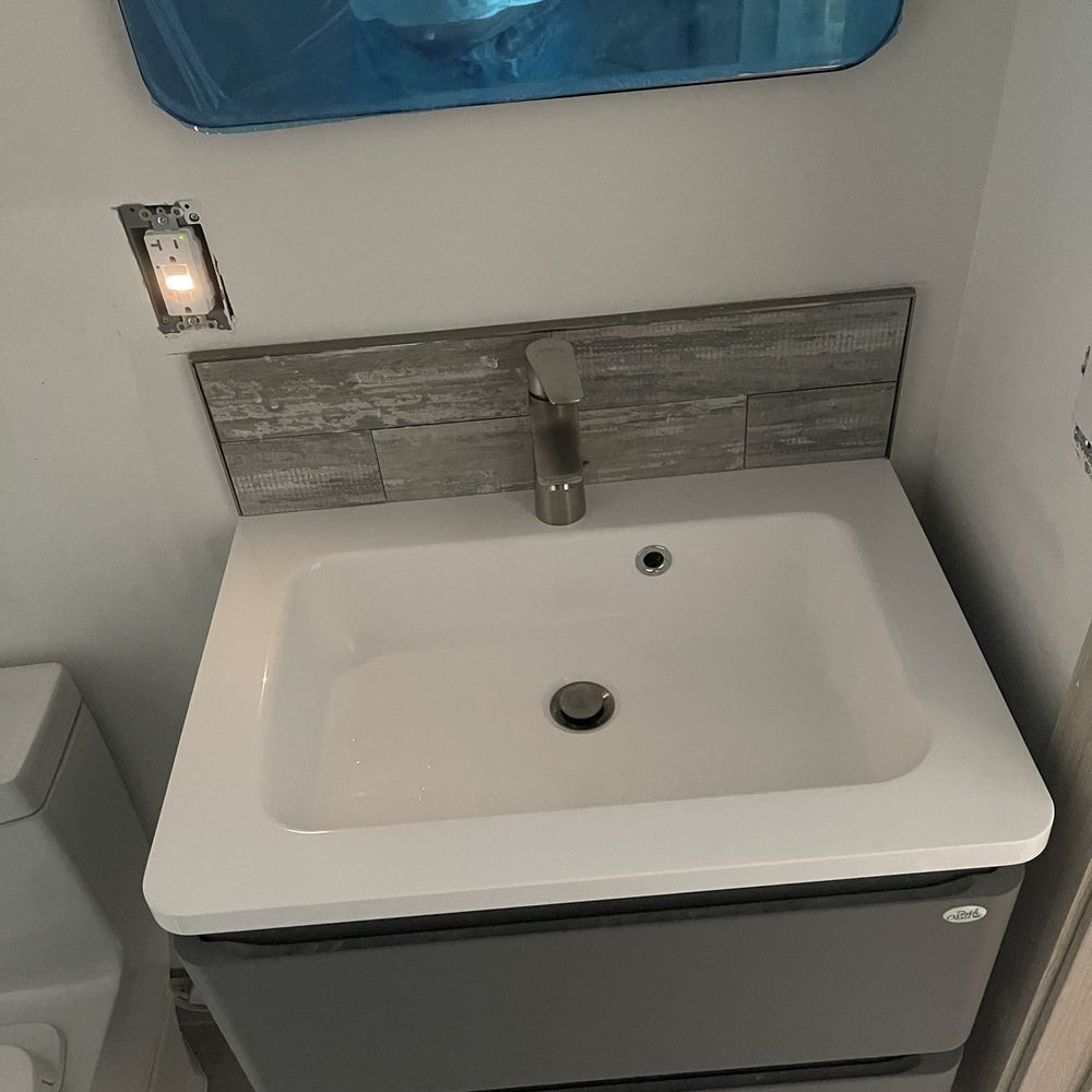 EZ Tile & Stone - New floating bath sink and cabinet - Flooring Near Me - Anaheim, California EZ Tile & Stone - New floating bath sink and cabinet - Flooring Near Me - Anaheim, California