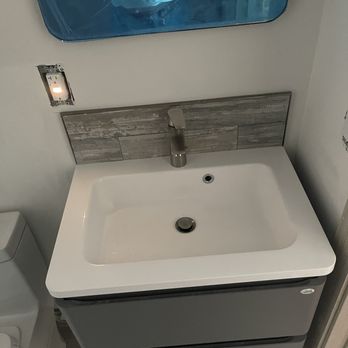 EZ Tile & Stone - New floating bath sink and cabinet - Flooring Near Me - Anaheim, California EZ Tile & Stone - New floating bath sink and cabinet - Flooring Near Me - Anaheim, California