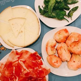 manchego cheese, tomato bread, padron peppers, jamon manchego cheese, tomato bread, padron peppers, jamon