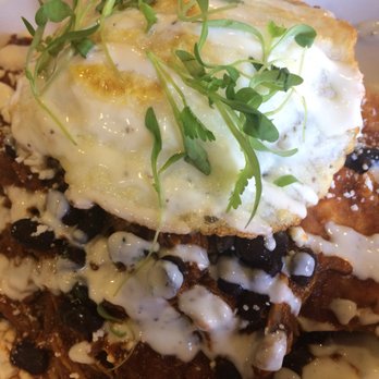 CRAFTkitchen - Chilequiles with carnitas and over medium egg! - New American Near Me - Henderson, Nevada
