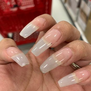 Pro Nails - Another angle of how bad these nails were. You can see that the color is still underneath and some black spot. - Nail Salons Near Me - Norfolk, Nebraska