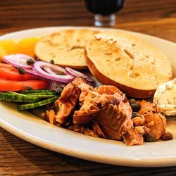 First Street Haven - NW Salmon Plate - Hot smoked salmon, toasted bagel, dill cream cheese, tomatoes, cucumbers, red onion, and capers