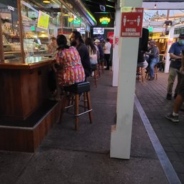 people sitting at the bar