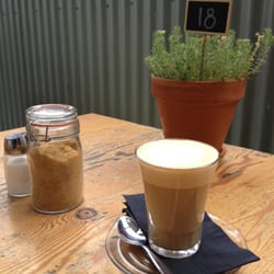 Whipped Bake Bar Cafe - Soy latte drinking out in their garden out back.