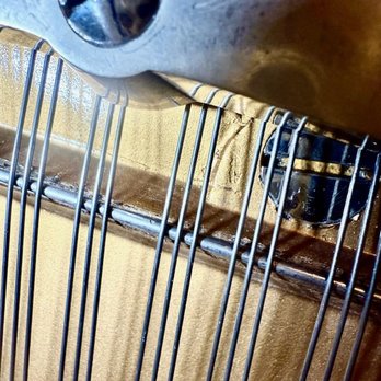 Master's Touch Piano Service - This is a closeup of the zero fret. - Piano Services Near Me - Rancho Cordova, California