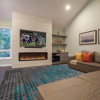 Interior Visions, LLC - The full-height, tiled fireplace makes a picturesque focal point for the living room. Sit back and enjoy watching The Big Game. - Interior Design Near Me - Bellevue, Washington Interior Visions, LLC - The full-height, tiled fireplace makes a picturesque focal point for the living room. Sit back and enjoy watching The Big Game. - Interior Design Near Me - Bellevue, Washington