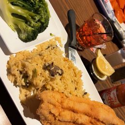 Fried Catfish with rice, pilaf and broccoli