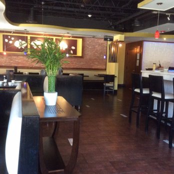 Rain Modern Chinese - Interior day. Lovely. Rain wall behind bar. - Dim Sum Near Me - Albany, New York