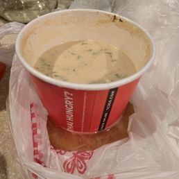 Soup spilled out into the bag... the lid was flimsey
