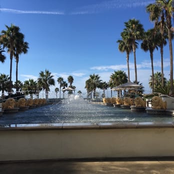 Watertable - The amazing fountains in the courtyard - New American Near Me - Huntington Beach, California