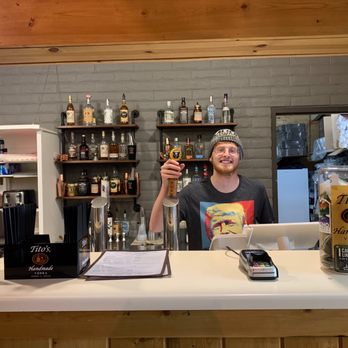 Off The Hook Deli - a man behind the counter - Pizza Near Me - Bridgeport, California Off The Hook Deli - a man behind the counter - Pizza Near Me - Bridgeport, California