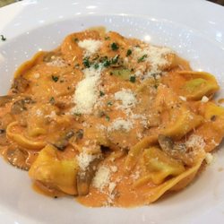 Pizza By Goli - Spinach tortellini with the best tomato creme sauce ever and wild mushrooms.