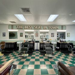 Orange Barber Company - Old school barbershop. Floor revamp October 2023.