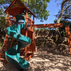 Kidz Backyard - Backyard Adventures Olympian Treehouse Jumbo with open spiral slide and monkey bars