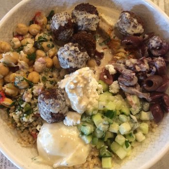 YAFO Kitchen - Half and half bowl (grain and hummus) with falafel, cucumber, tahini, olives, feta, chickpeas (and some accidental tabouli). Delicious! - Middle Eastern Near Me - Charlotte, North Carolina YAFO Kitchen - Half and half bowl (grain and hummus) with falafel, cucumber, tahini, olives, feta, chickpeas (and some accidental tabouli). Delicious! - Middle Eastern Near Me - Charlotte, North Carolina