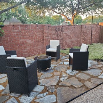 Outdoor Orchestrators - a patio with chairs and a fire pit - Landscaping Near Me - Bixby, Oklahoma Outdoor Orchestrators - a patio with chairs and a fire pit - Landscaping Near Me - Bixby, Oklahoma