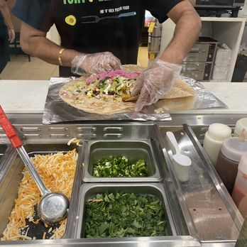 Tortilla St. - a man making tortillas - Indian Near Me - Ajax, Ontario Tortilla St. - a man making tortillas - Indian Near Me - Ajax, Ontario