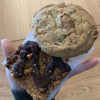 Goldenrod Pastries - a hand holding two cookies - Gluten-Free Near Me - Lincoln, Nebraska