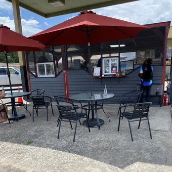 Rudy's - the outside of a restaurant with tables and umbrellas - Food Stands Near Me - Cedartown, Georgia Rudy's - the outside of a restaurant with tables and umbrellas - Food Stands Near Me - Cedartown, Georgia