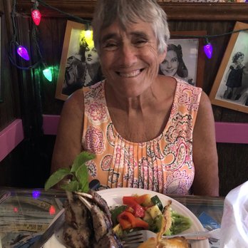 The Bubble Room - Birthday Girl with Lamb chops - Desserts Near Me - Captiva, Florida