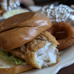 Mayfair Seafood - Lunch special fish sandwich served on a brioche bun. Delicious