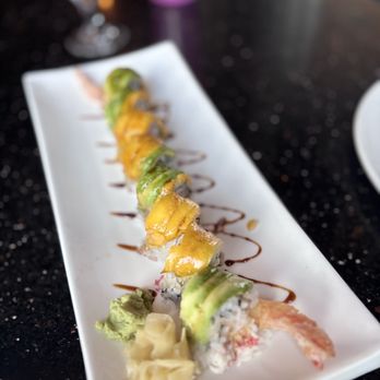 John Holly's Asian Bistro - Caterpillar Roll - Asian Fusion Near Me - Lone Tree, Colorado John Holly's Asian Bistro - Caterpillar Roll - Asian Fusion Near Me - Lone Tree, Colorado