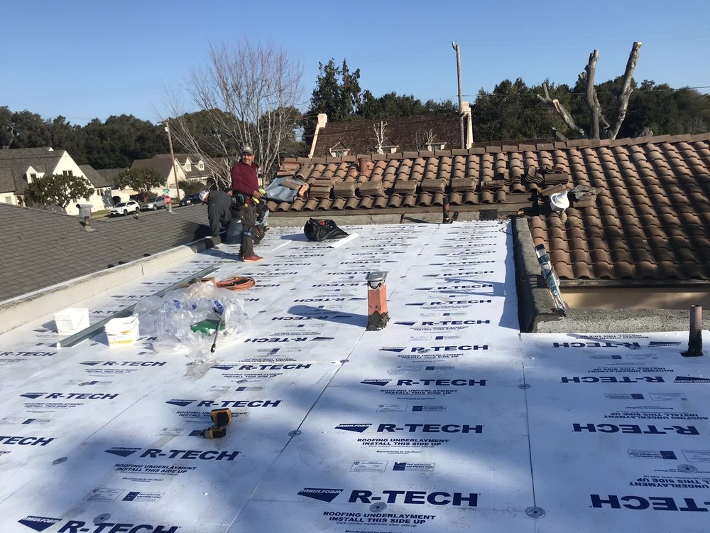 Slide of Re Roof All American