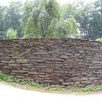 Whirlwind Fine Garden Design - a stone wall - Gardeners Near Me - Amherst, Massachusetts Whirlwind Fine Garden Design - a stone wall - Gardeners Near Me - Amherst, Massachusetts