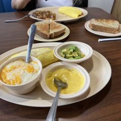 Marmalade - Build your own omelette: Veggie omelette, rye toast, hollandaise sauce and avocado on the side with cheese grits.