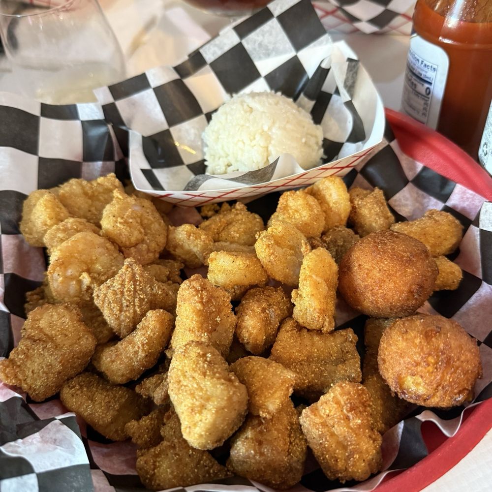 Fried shrimp and catfish combo, coconut rice Fried shrimp and catfish combo, coconut rice