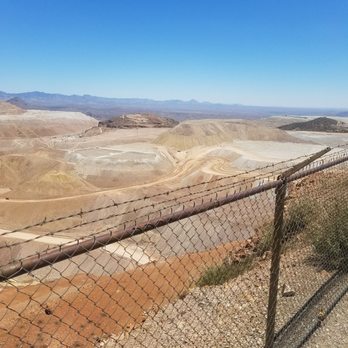 Riley Industrial Services - a chain link fence overlooking a desert landscape - General Contractors Near Me - Show Low, Arizona Riley Industrial Services - a chain link fence overlooking a desert landscape - General Contractors Near Me - Show Low, Arizona