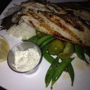Max's Grille - entree of trout greens and rice (three course special) - New American Near Me - Boca Raton, Florida Max's Grille - entree of trout greens and rice (three course special) - New American Near Me - Boca Raton, Florida