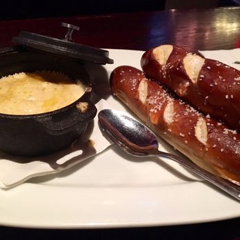 Marlow's Tavern - Brie fondue and pretzel - New American Near Me - Alpharetta, Georgia Marlow's Tavern - Brie fondue and pretzel - New American Near Me - Alpharetta, Georgia