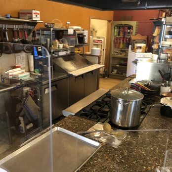 The Copper Q - odd kitchen placement? I have no problem with this, just adds to the weirdness of the ambiance. - Bakeries Near Me - Big Bear Lake, California